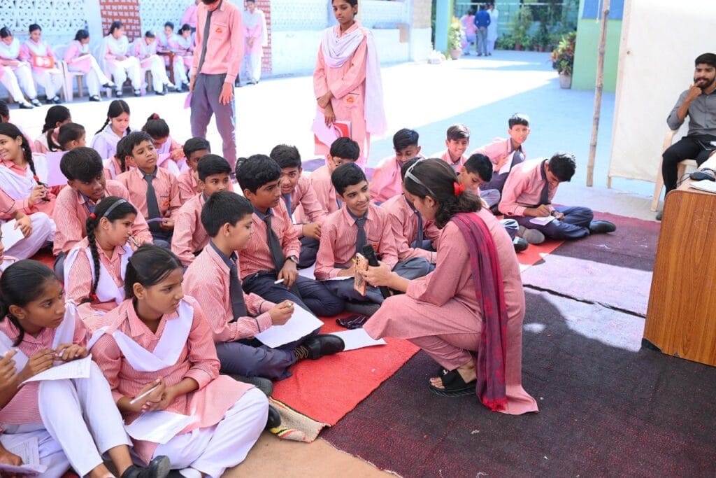 CYCD Recreational Activities Smiling children painting during an art workshop organized by CYCD.