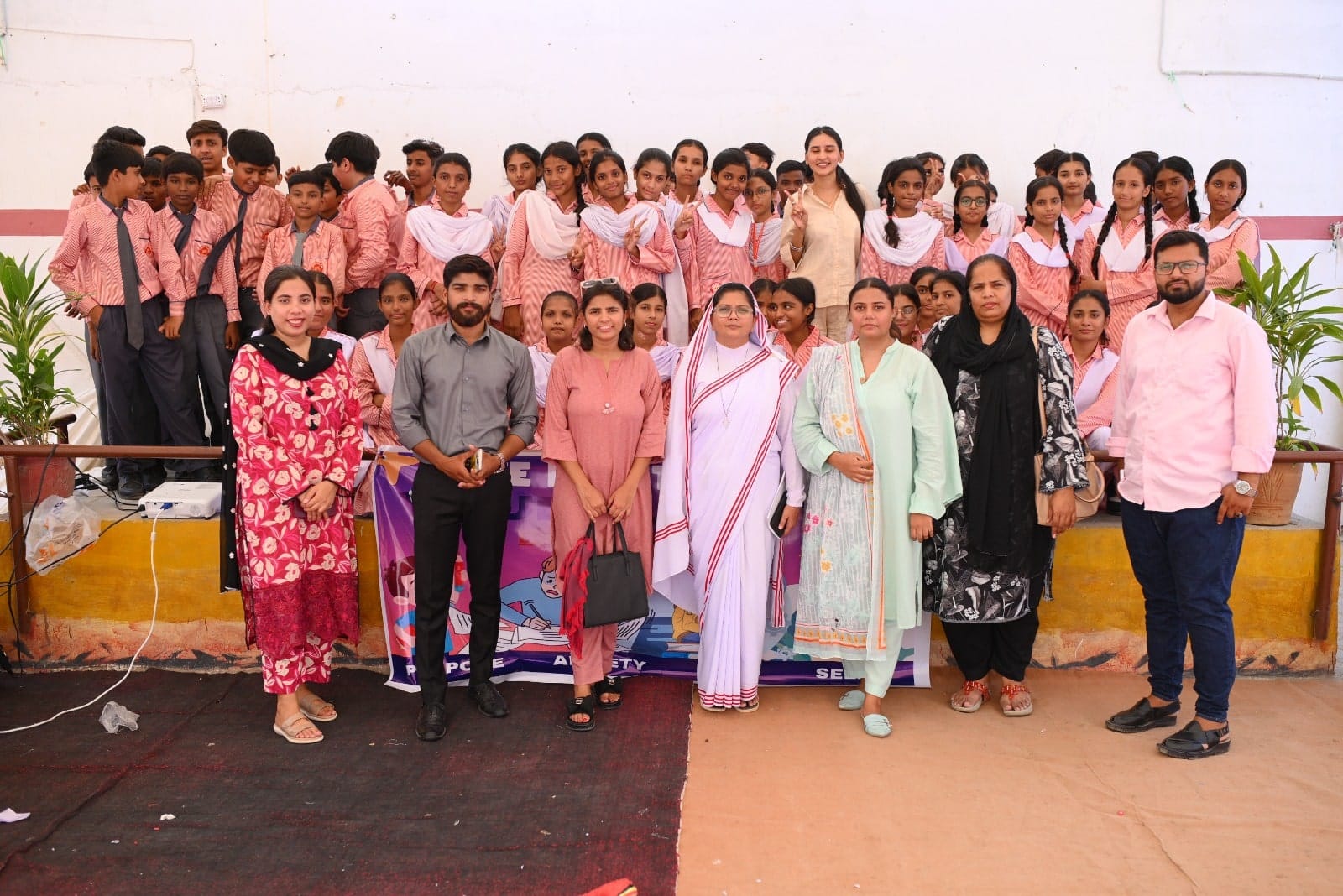 CYCD group smiling and celebrating after a educational workshop